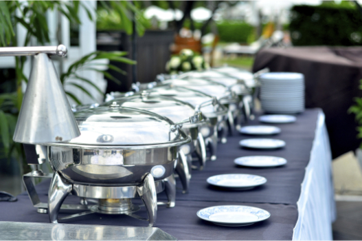 Catering tables set up and ready to serve